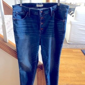 Madewell, mid rise button-front frayed hem jeans.